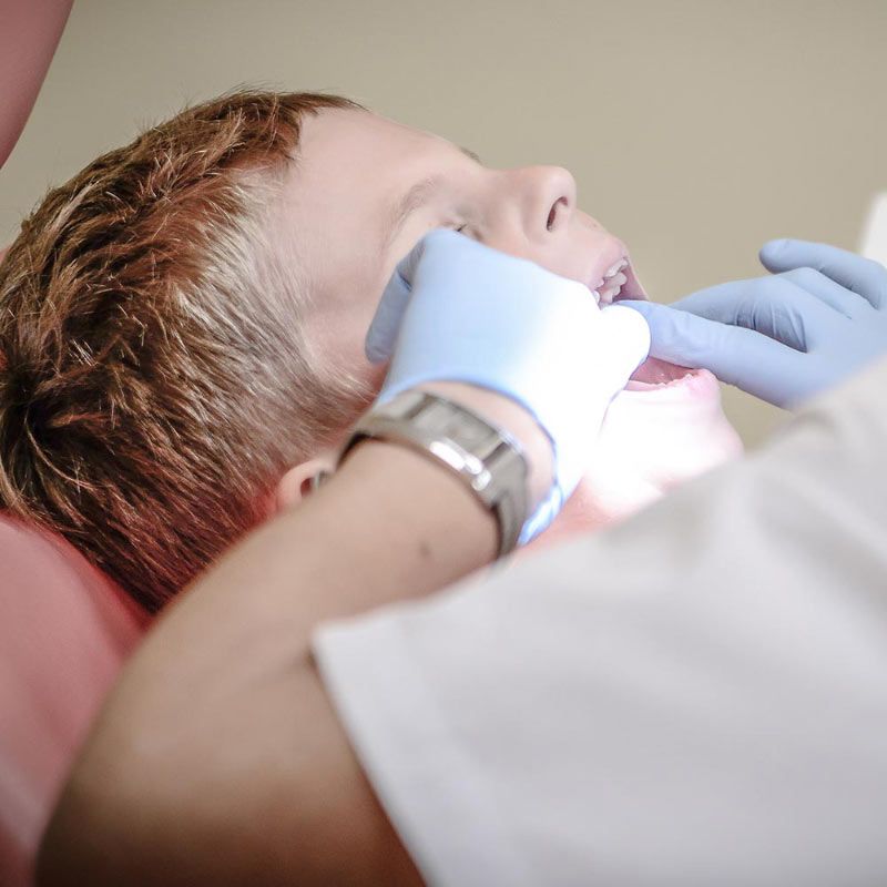 Dentist Working on Childs Teeth